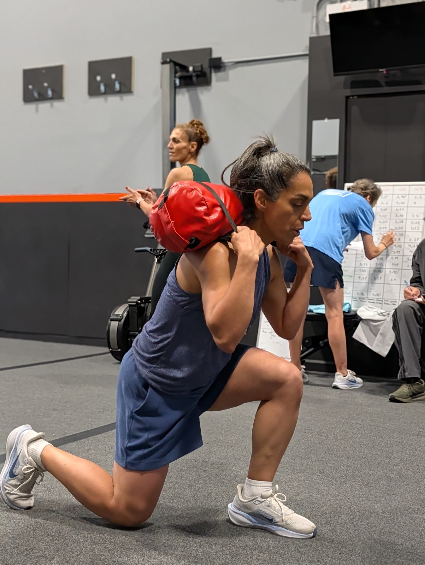 Sandbag reverse lunges — HYROX-style strength